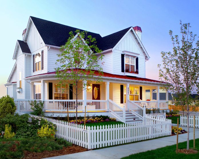 Traditional house with white picket fence