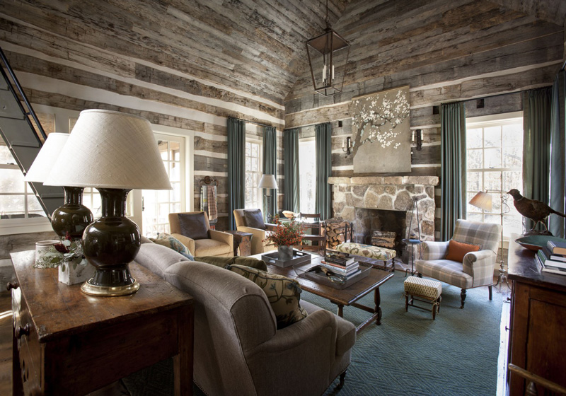 Traditional rustic living room with stacked stone fireplace rock