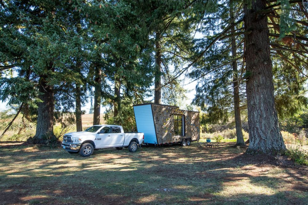 Transportable tiny home with a climbin wall