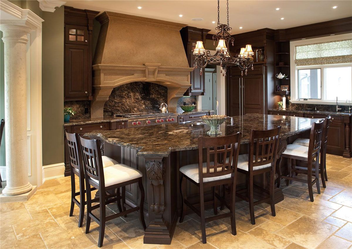 Travertine kitchen floor and brown solid wood furniture