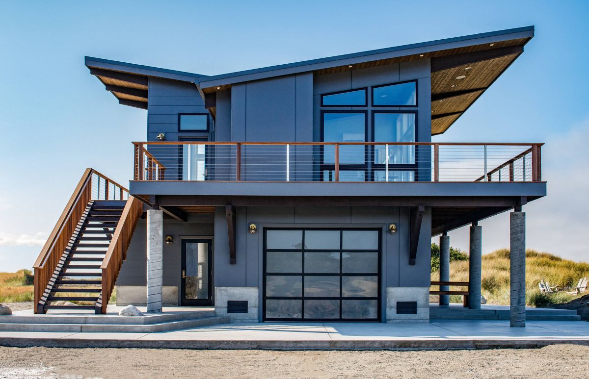 Trendy Three Story Home with Butterfly Roof