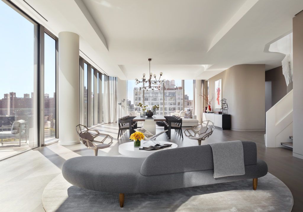 The open plan living space makes the most of the windows and plentiful natural light.