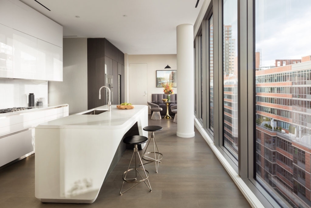 A neutral palette and sleek cabinetry are good choices for an urban kitchen.