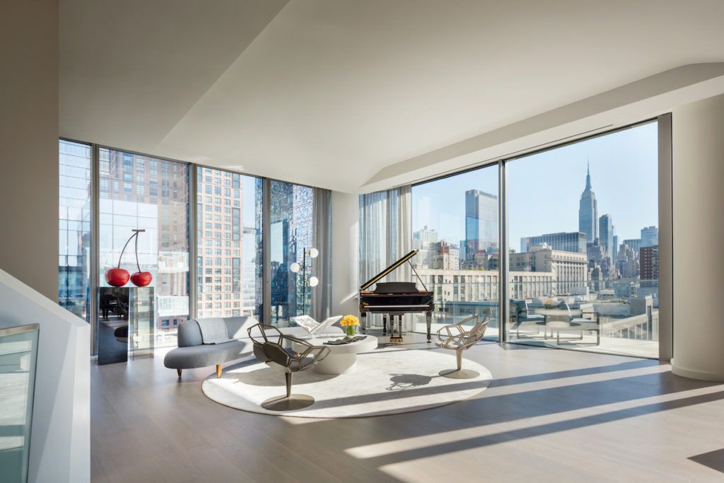 Floor-to-ceiling corner windows offer spectacular views.