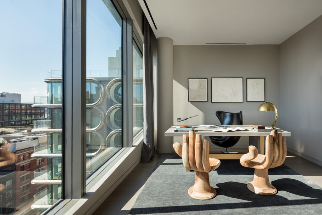 Home office space is functional and attractive with the views.