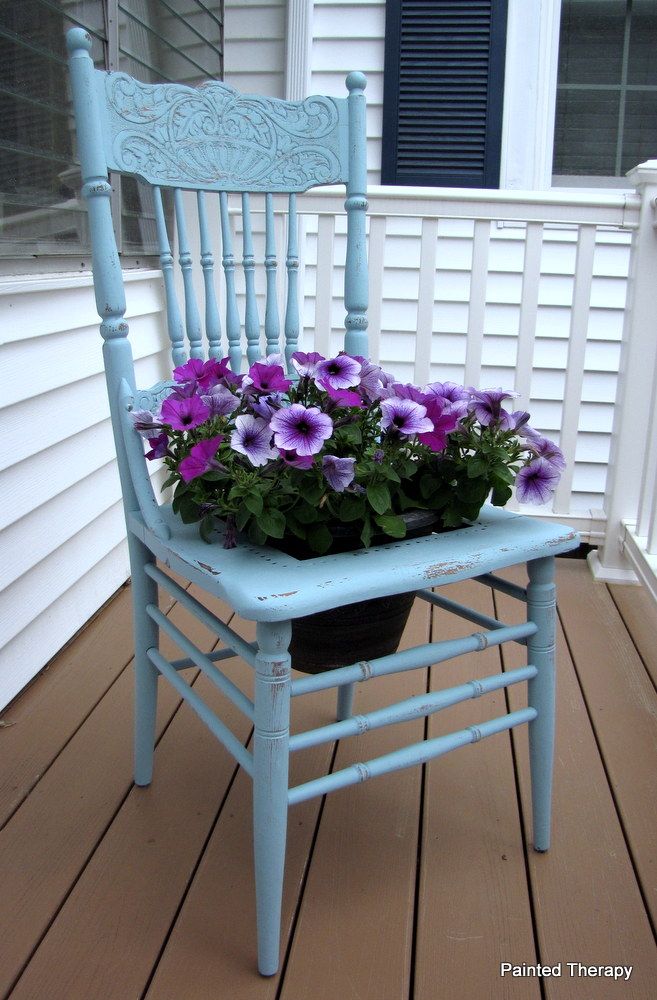 Turn an old chair into a planter for garden or porch