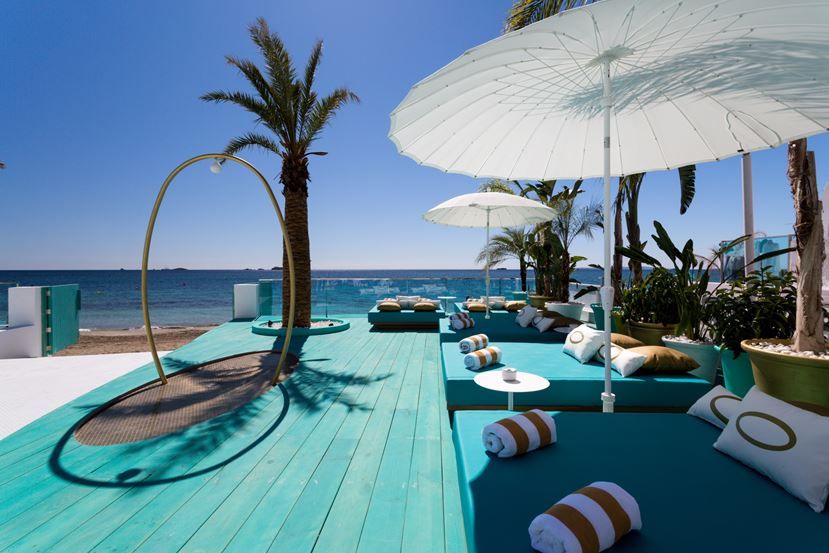 Turquoise painted backyard beach deck