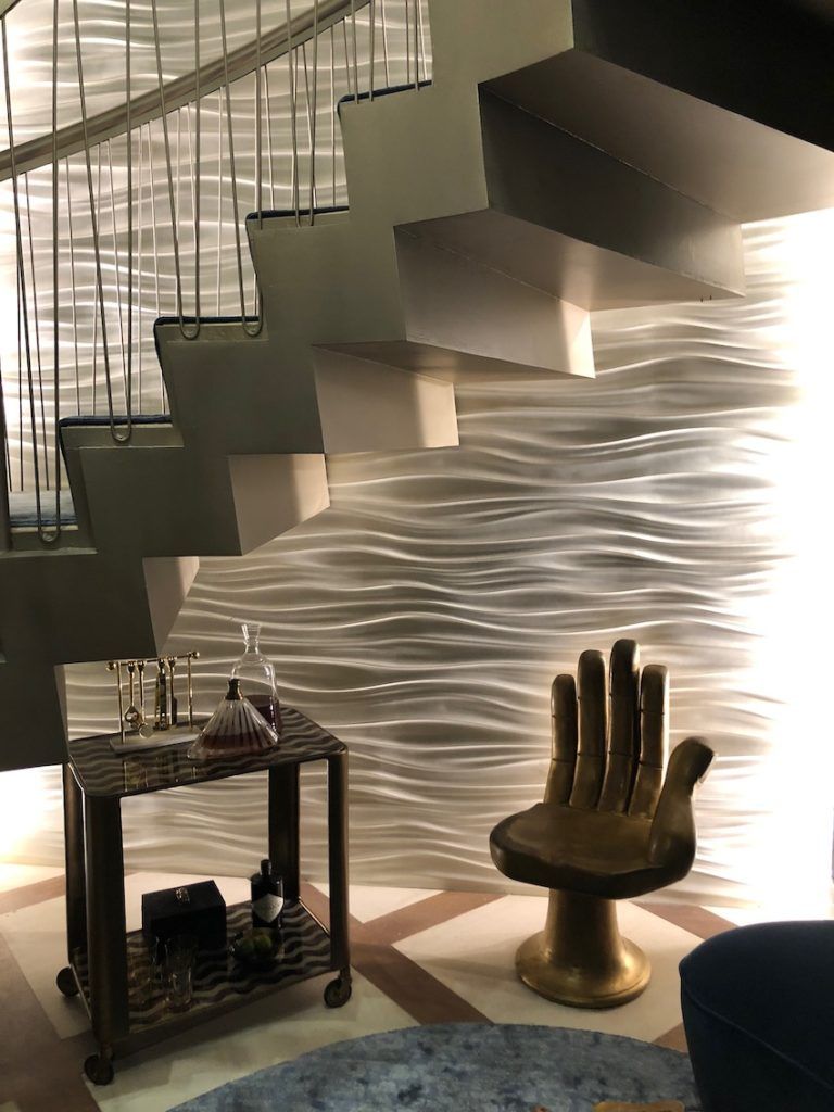 Artful elements and quirky accessories create a dramatic space.