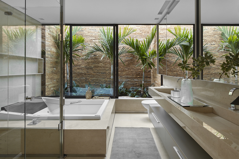 The master bathroom even has its own mini garden which brings in a fresh vibe as well as natural light