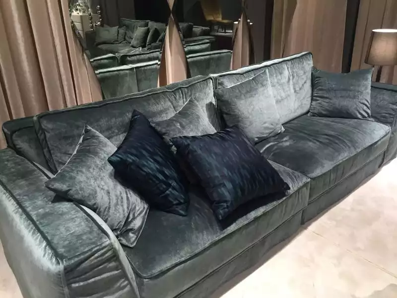 velvet-sofa-and-throw-pillows