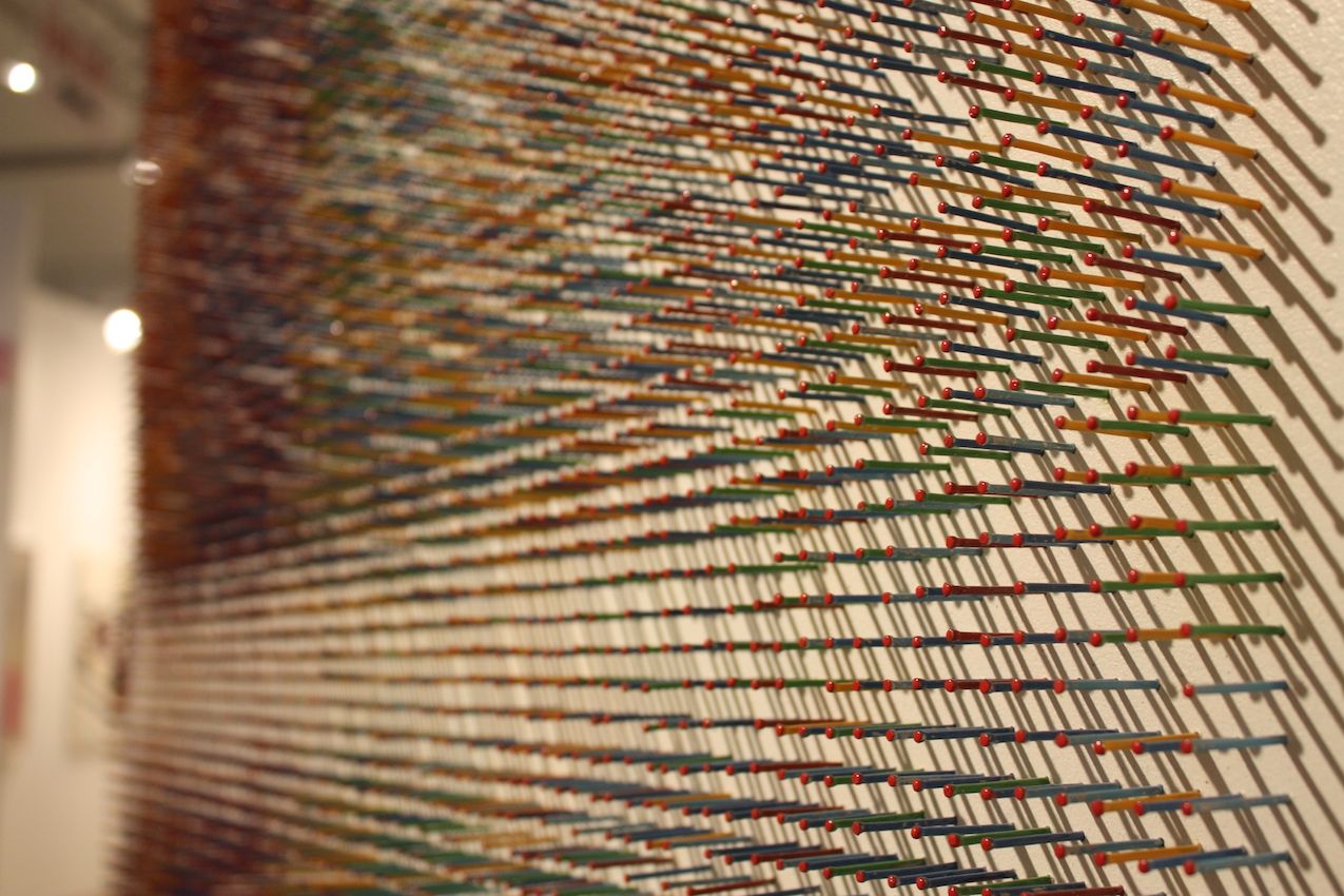 The overall image of the work belies the complexity of the colors and construction.