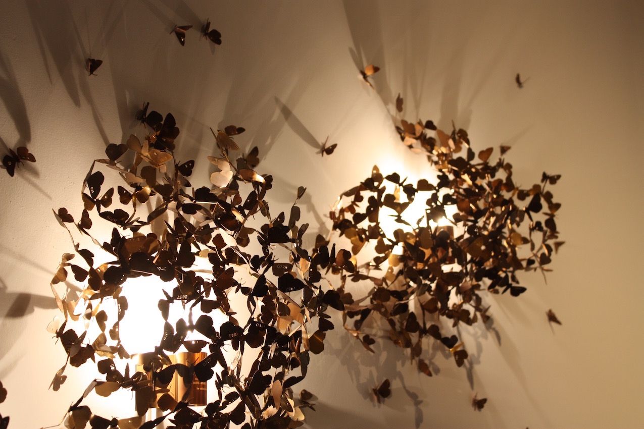 Hundreds of individually crafted brass moths make up these lighting fixtures. Actually, Limited moths is part of the RealLimited series, which points out limitations in reality. The design is a portrait of the moth species Catcall converse, which is highly endangered in Austria.