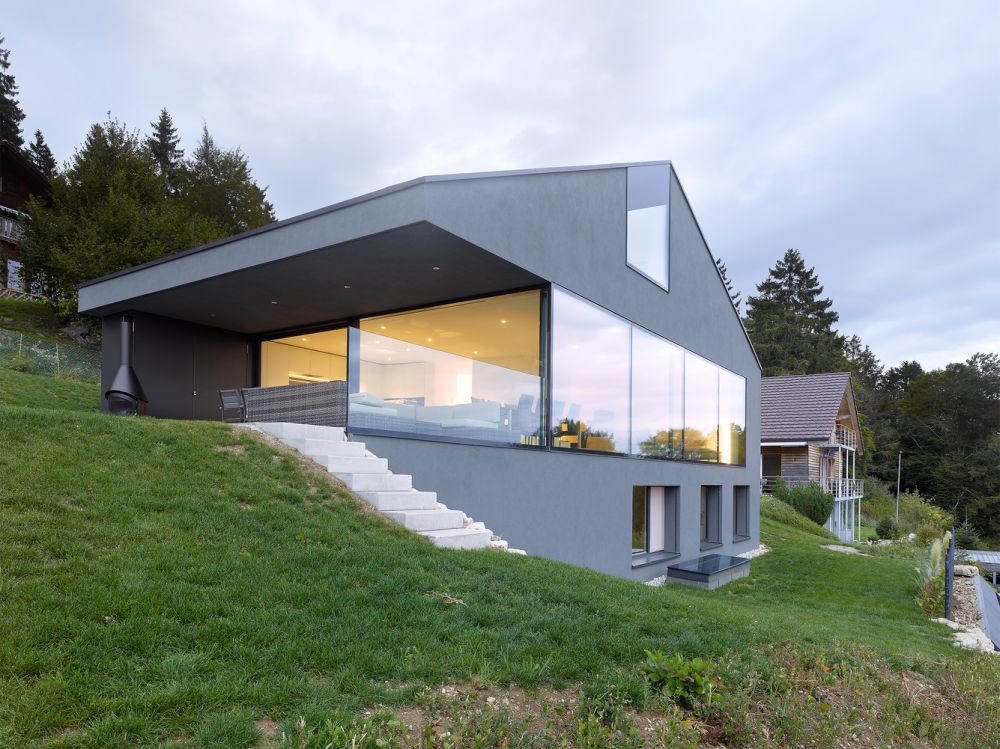 Villa Erard à Nods Switzerland by Andrea Pelati Architecte glass balustrade