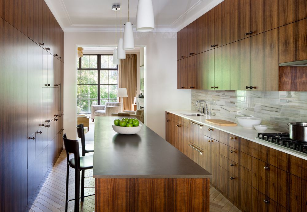 The large kitchen features stunning wood for the cabinetry.