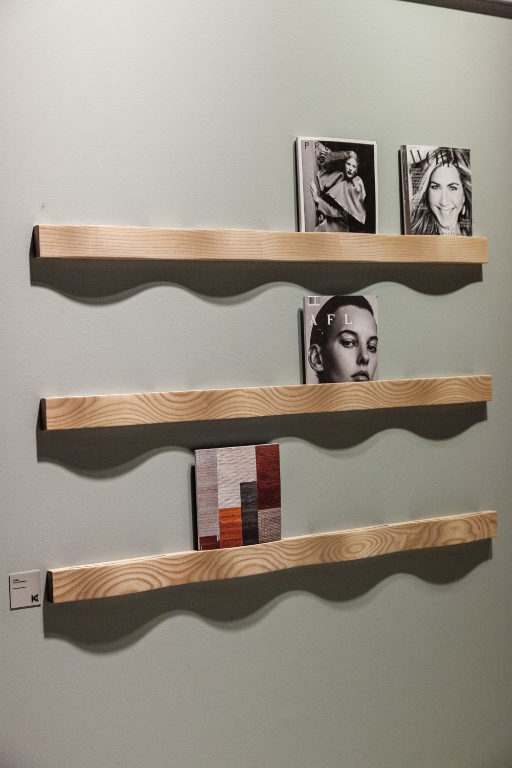 These shallow and minimalist wall shelves are designed to keep magazines. An interesting alternative to a rack