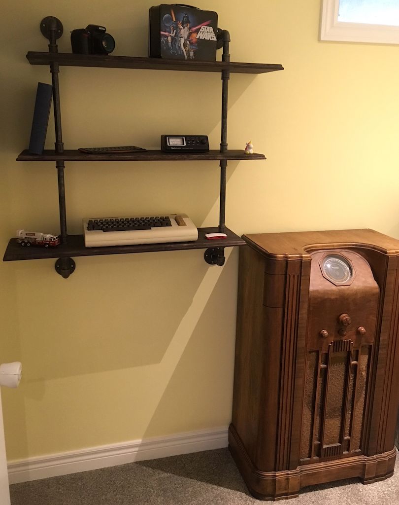 Wall pipe shelving