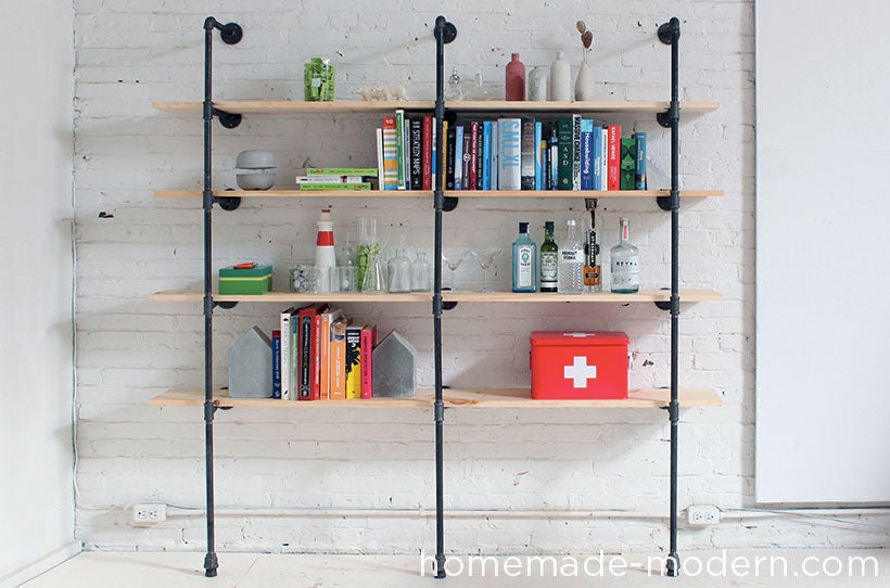 Wall shelf made from pipes and wood