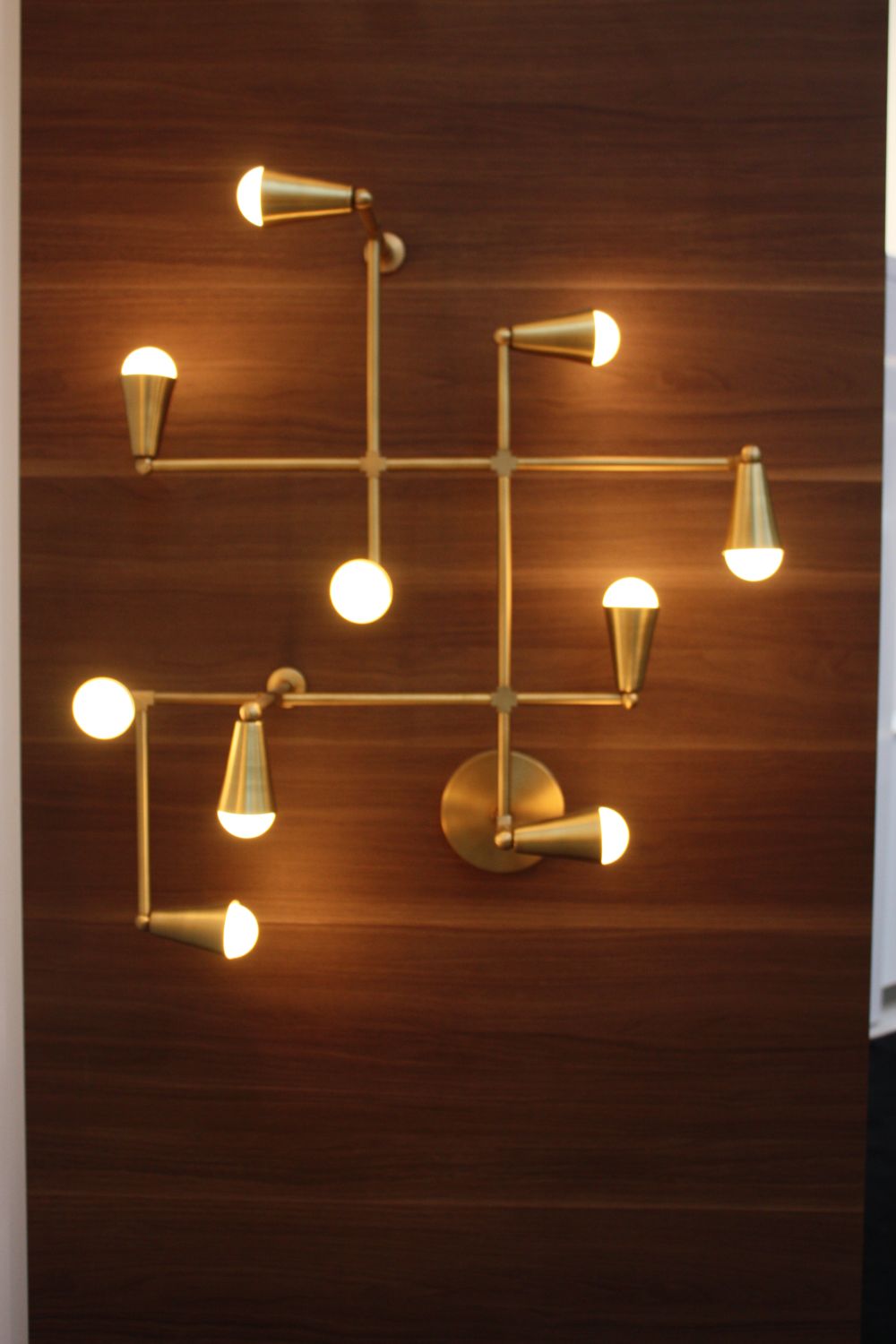 Walnut walls with copper lighting