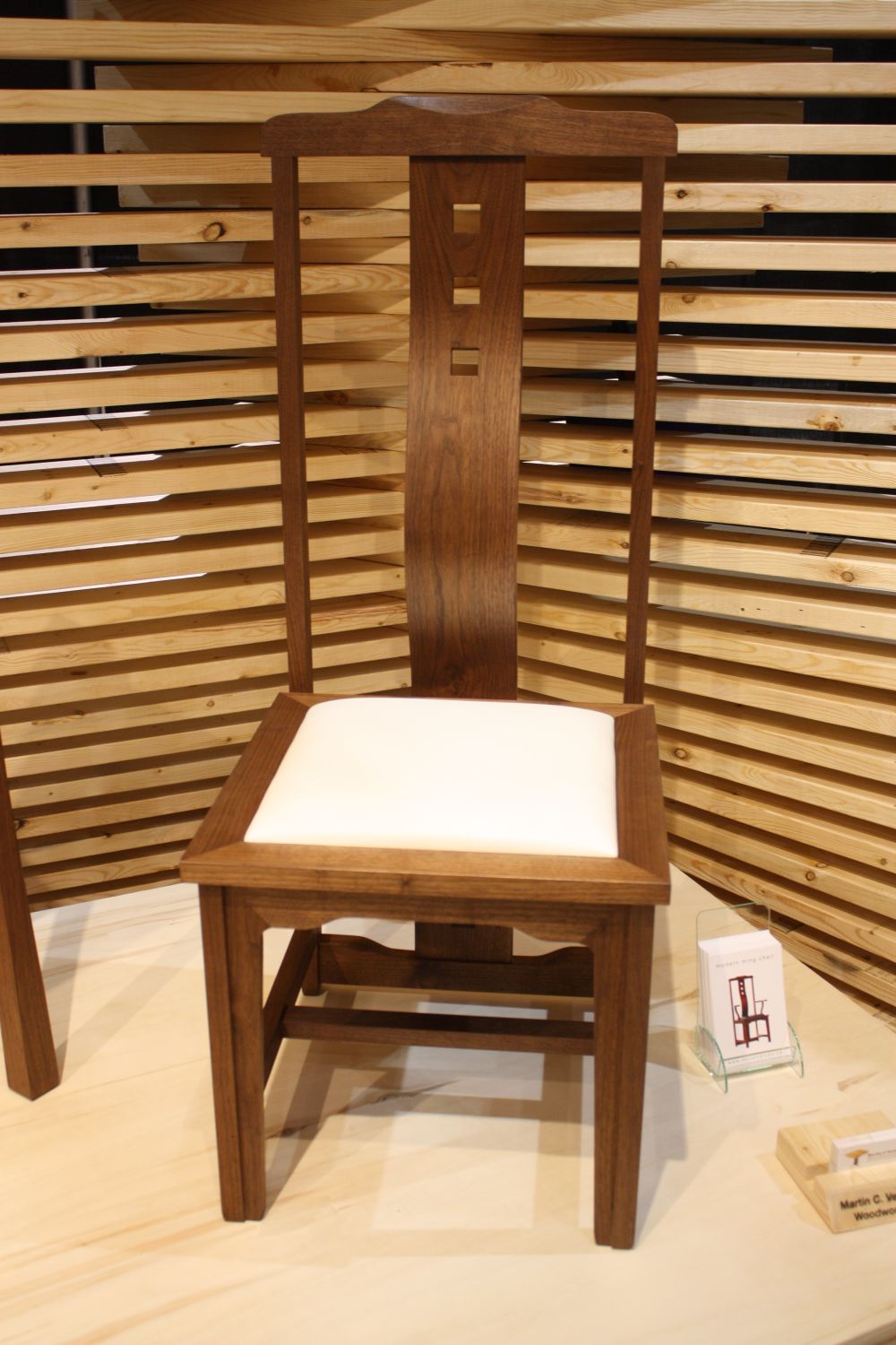 Walnut wood chair with white seating
