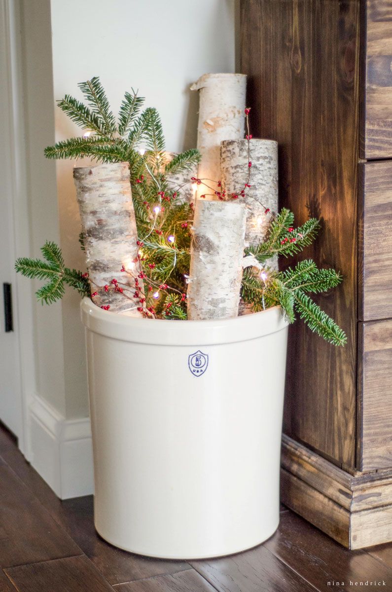 Warm Cozy Bucket with wood Logs and string Lights