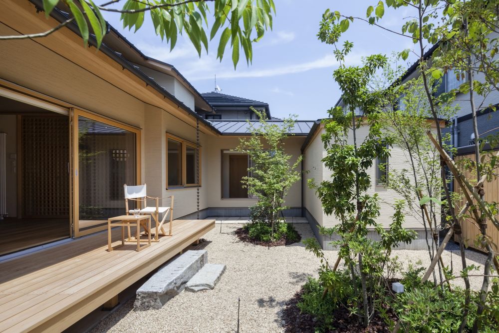 Warm Final Residence designed by Takashi Okuno interior backyard