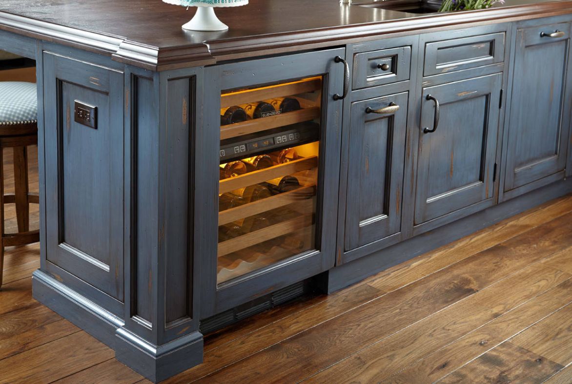 Washed kitchen island design with wine fridge