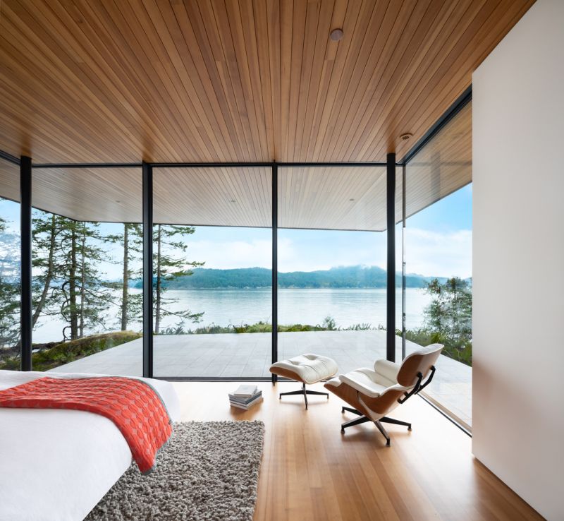 Waterfront cabin with a forest backdrop dorm