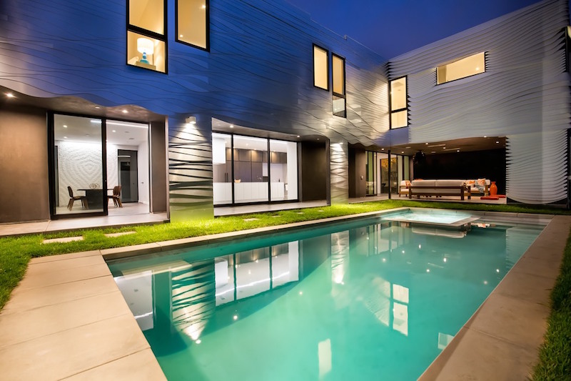 Wave House outdoor living space by the pool