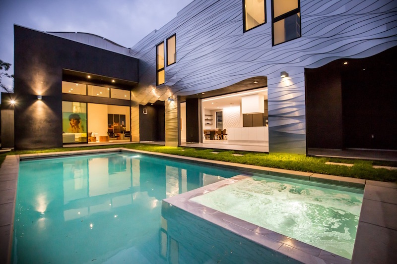 Wave House wraped around the pool