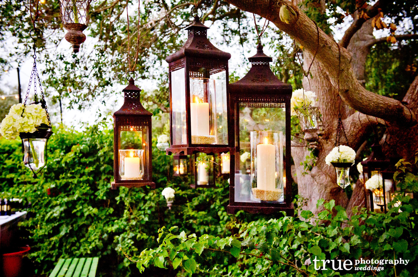 Vintage hanging lanterns with candles