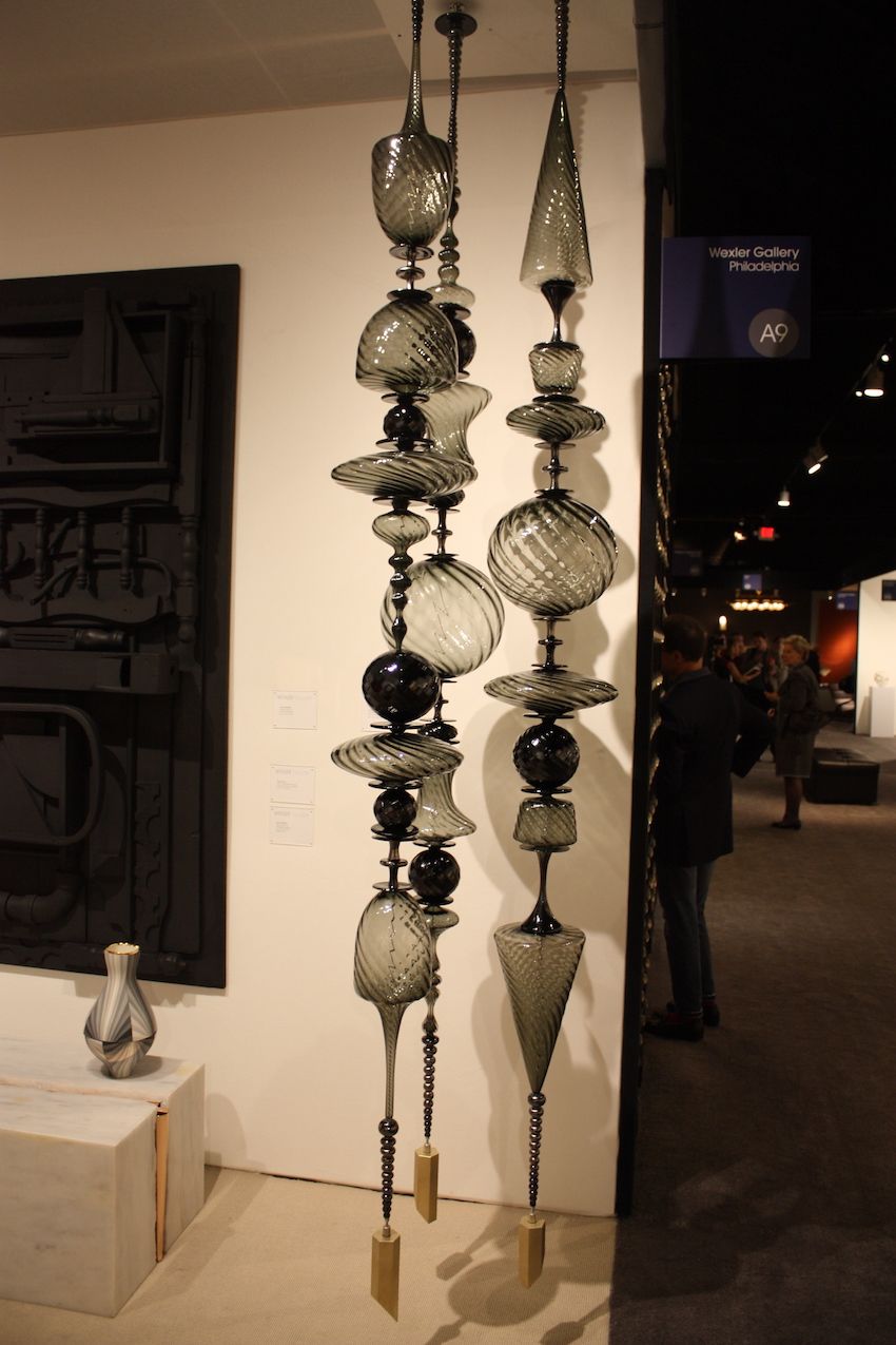 The smoky color of the glass adds drama.