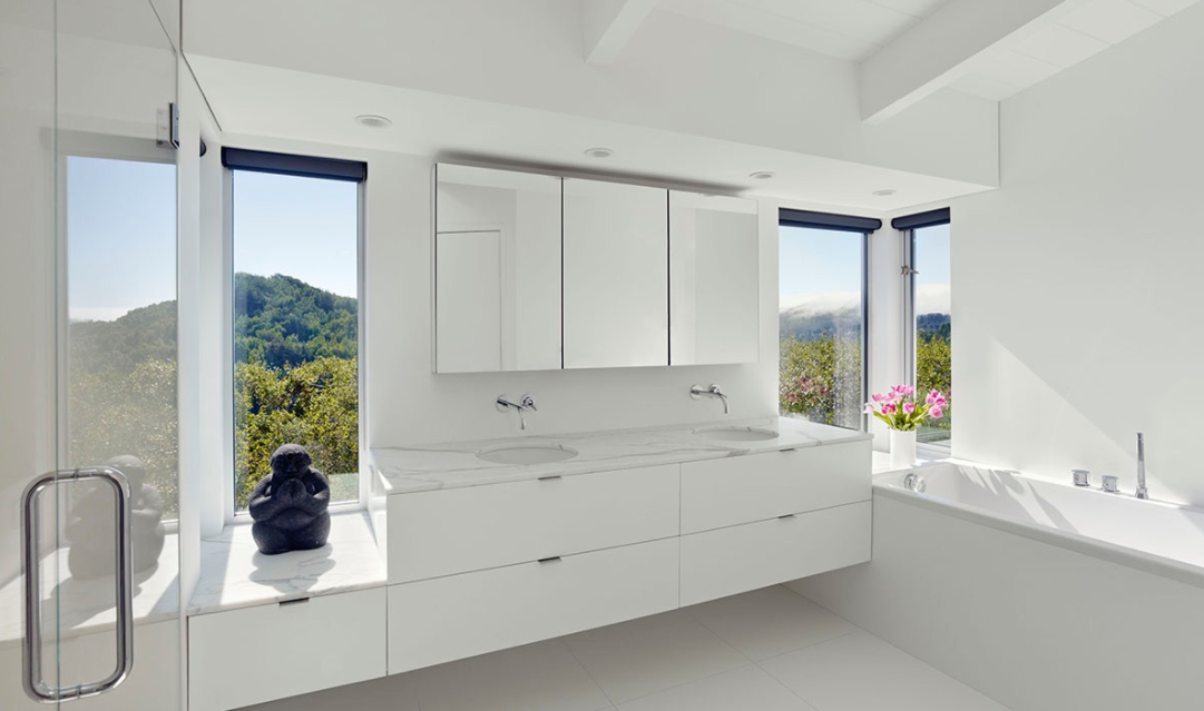 White bathroom with large windows