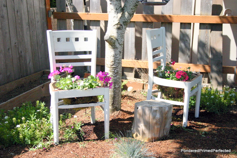 White chairs turned into planters