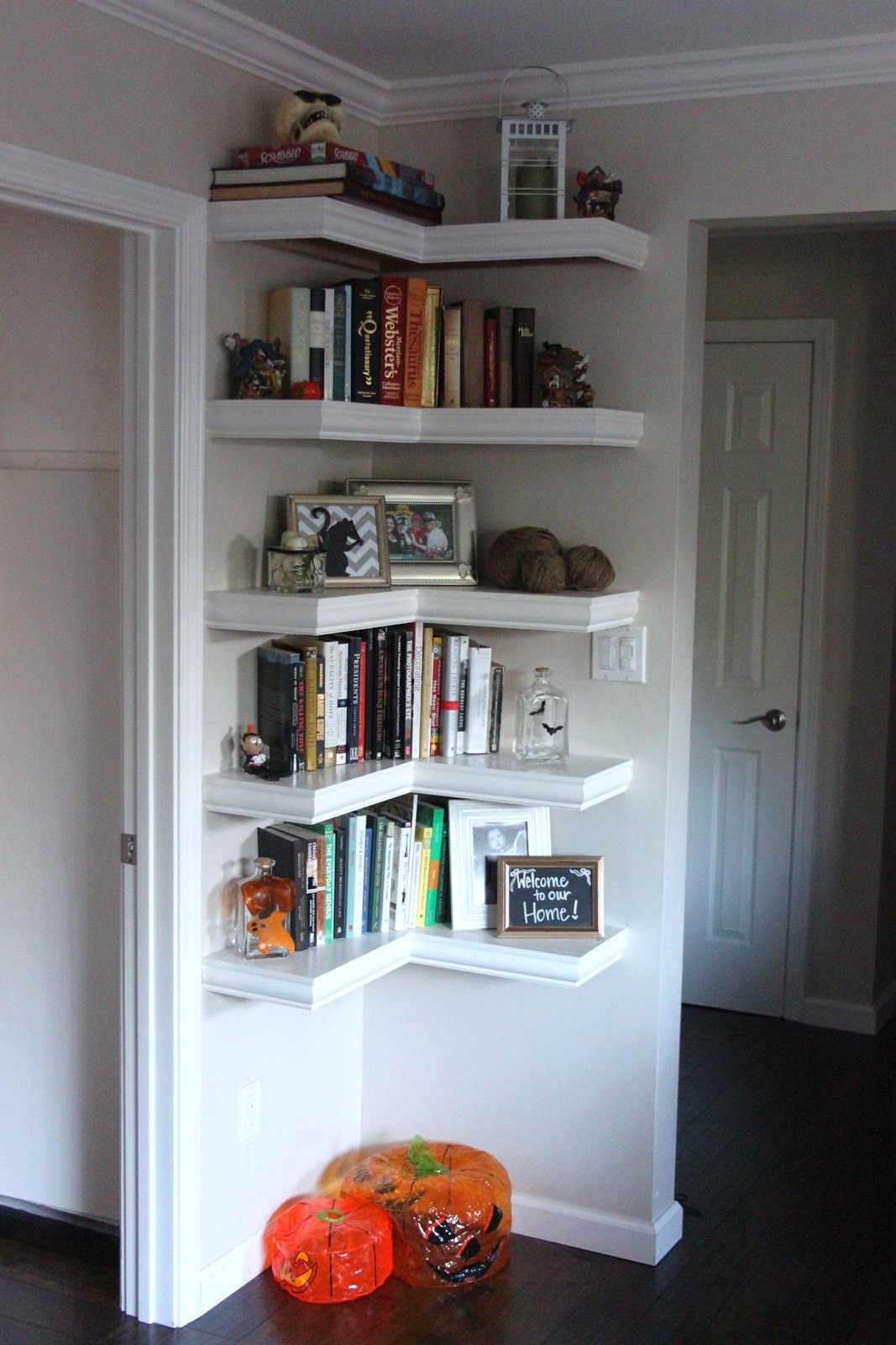 White corner shelves for books storage