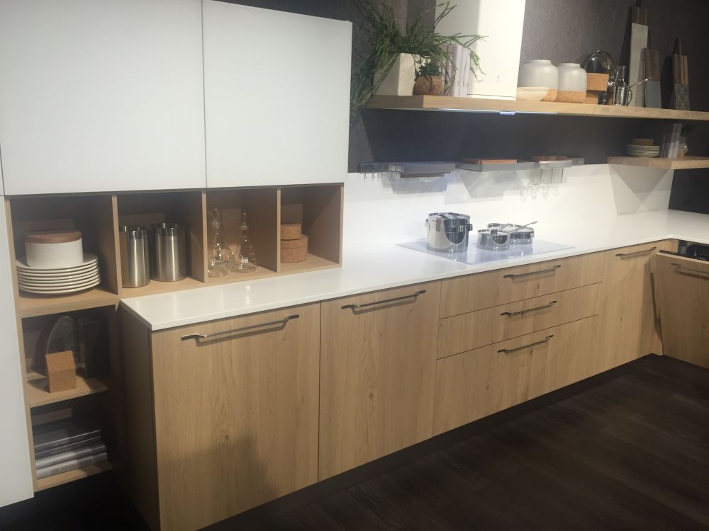 White countertop and brown wood cabinet
