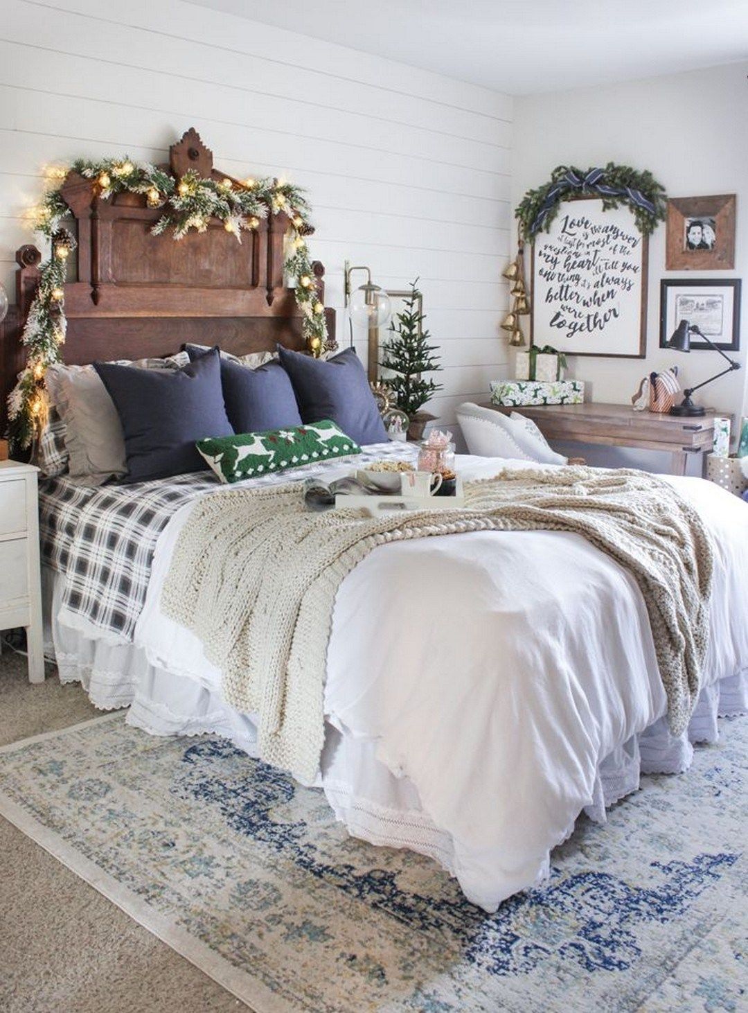 White farmhouse bedroom decorated for Christmas