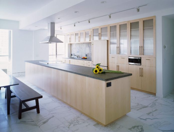 White marble floor and brown kitchen