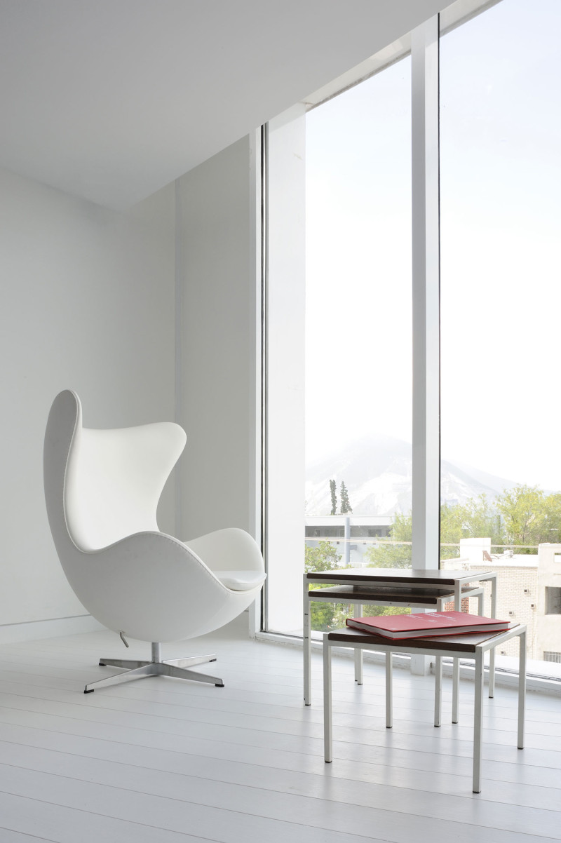 White upholstered egg chair design