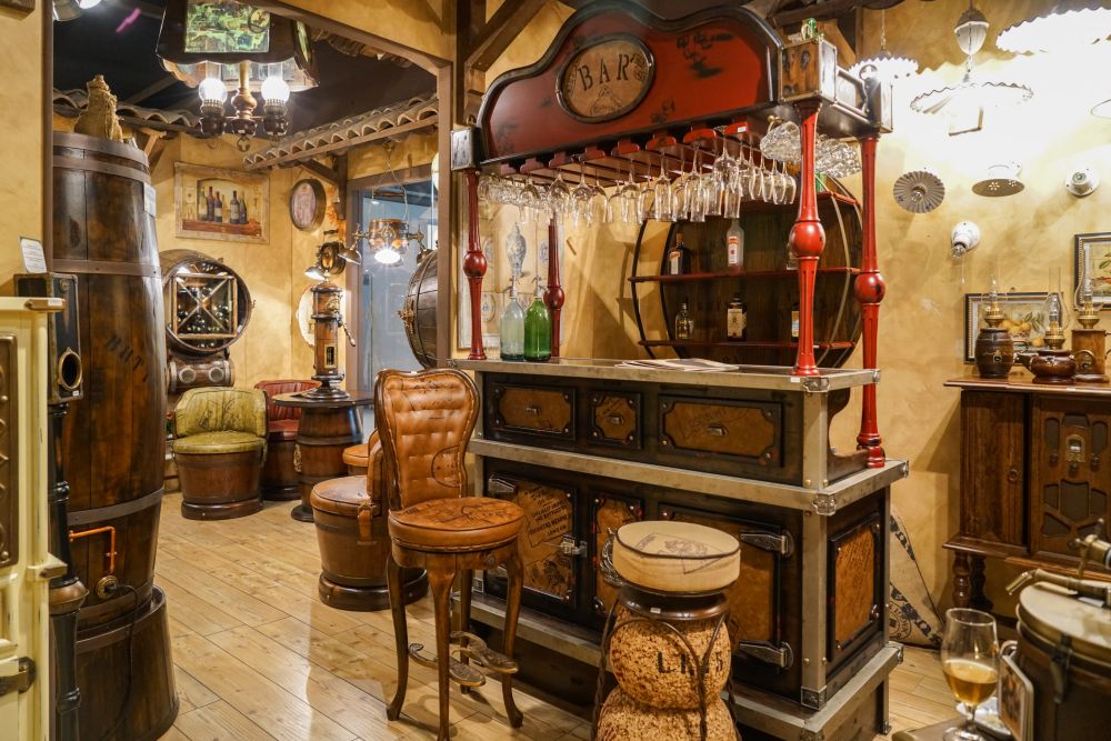 Wine bar area with swivel leather stool and champagne stool