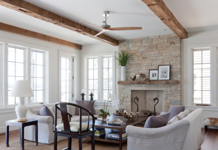 Wood beams and stone fireplace