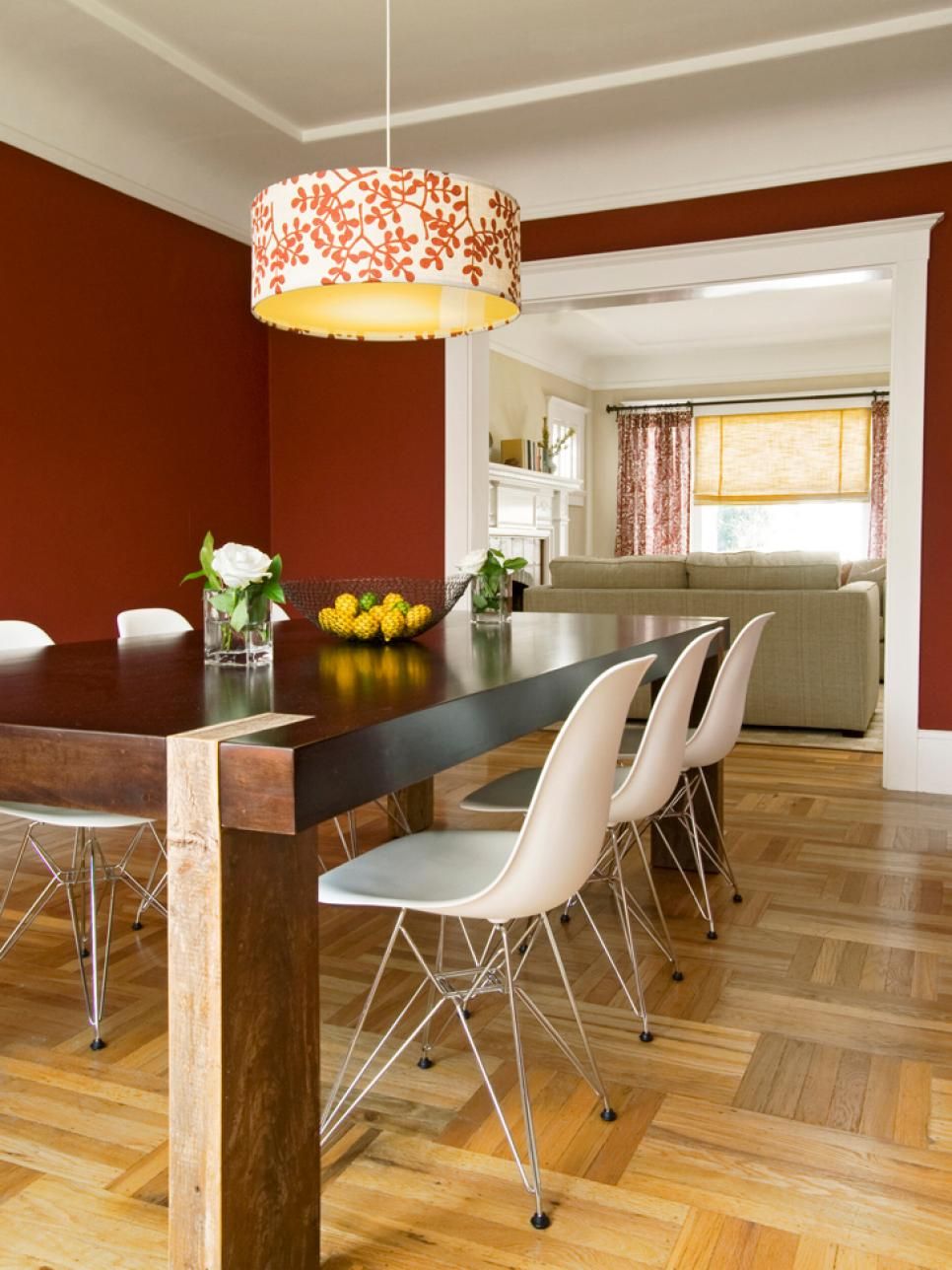 Wood dining table with plastic chairs