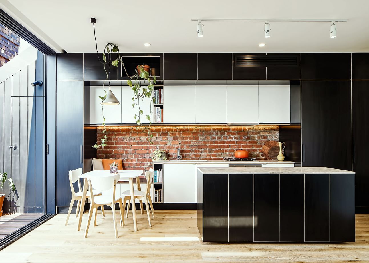 Wood kitchen decor with exposed bricks for backsplash