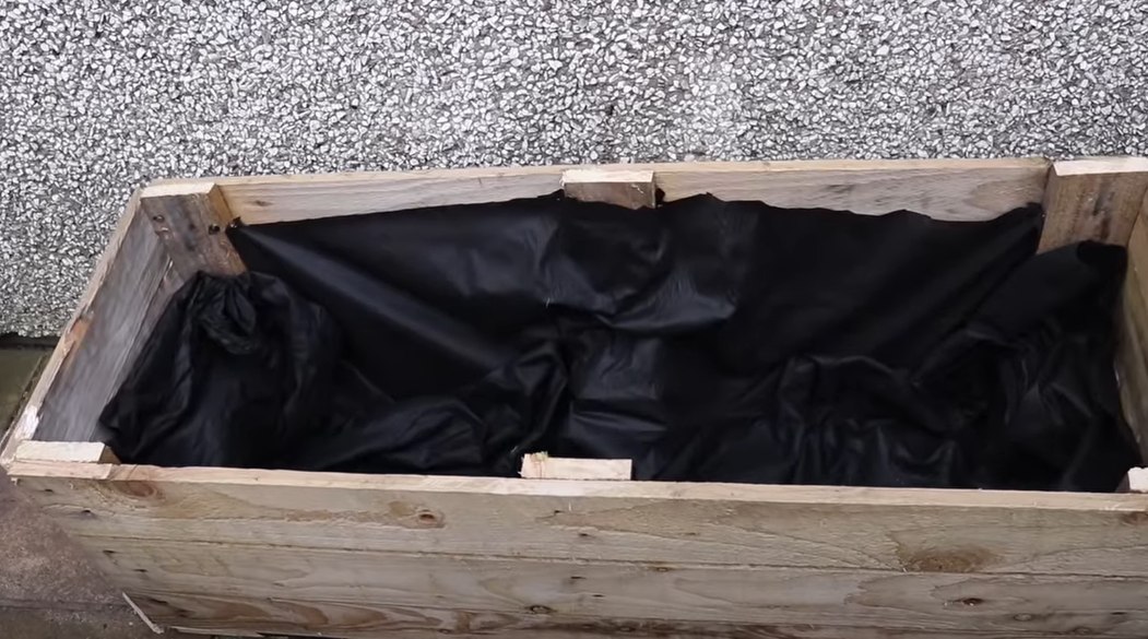 Turn a Pallet Into a Planter Box build a pallet planter