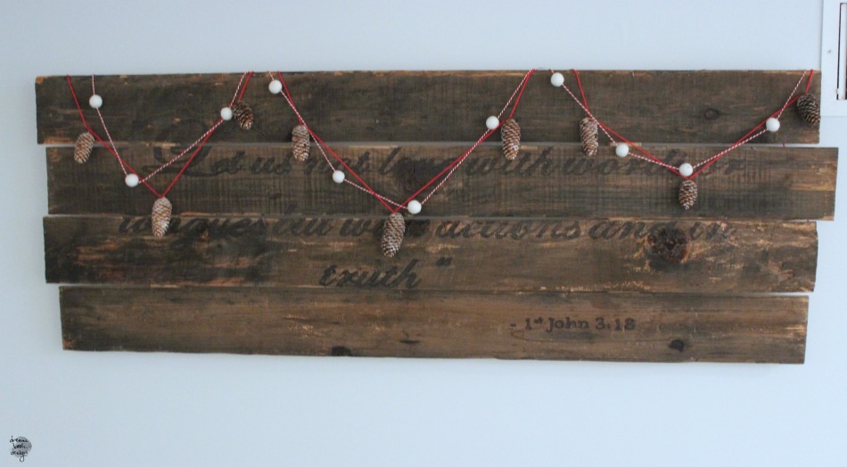 Wood plank decorated with gerlands for Christmas