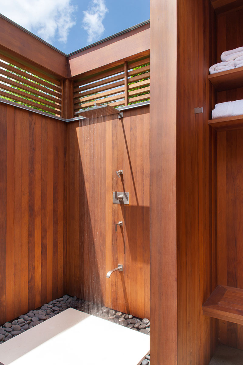 Wood surrounded outdoor shower design