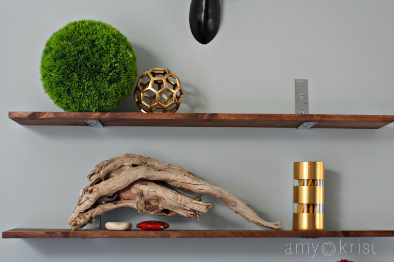Wooden shelf with industrial metalic brackets