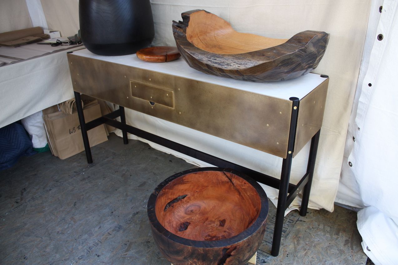 The newest piece is the brass Phillips Console.