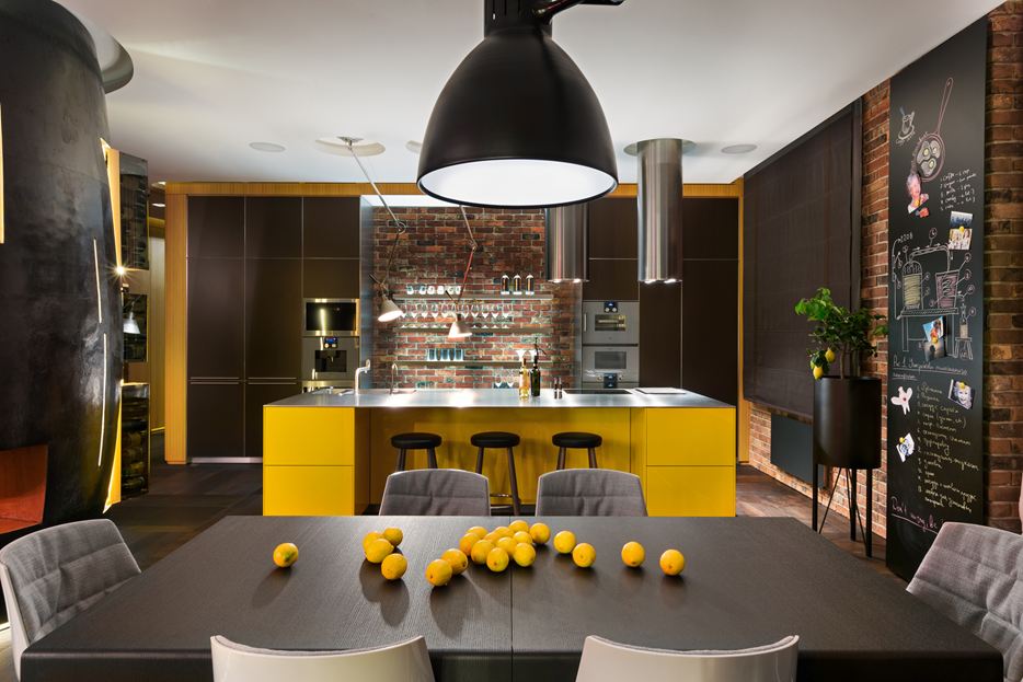 Yellow and bricks accents in kitchen