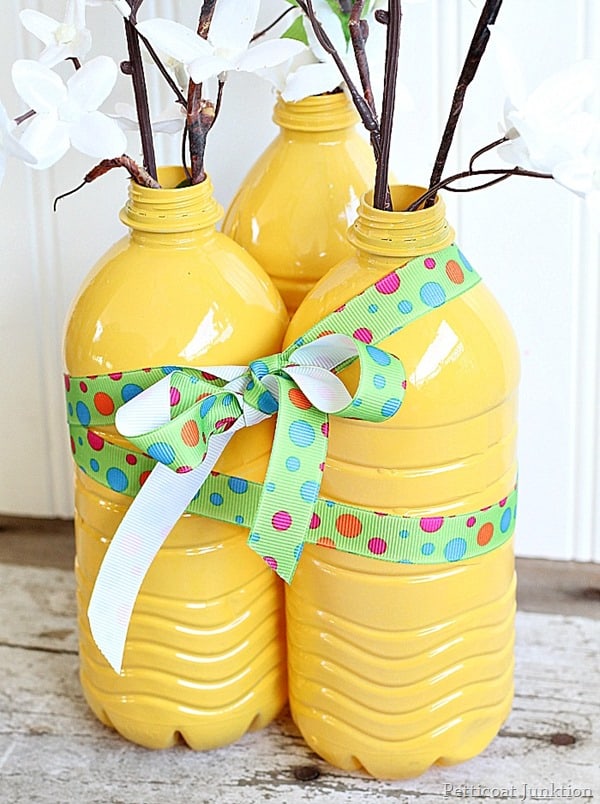 Yellow plastic bottle vase