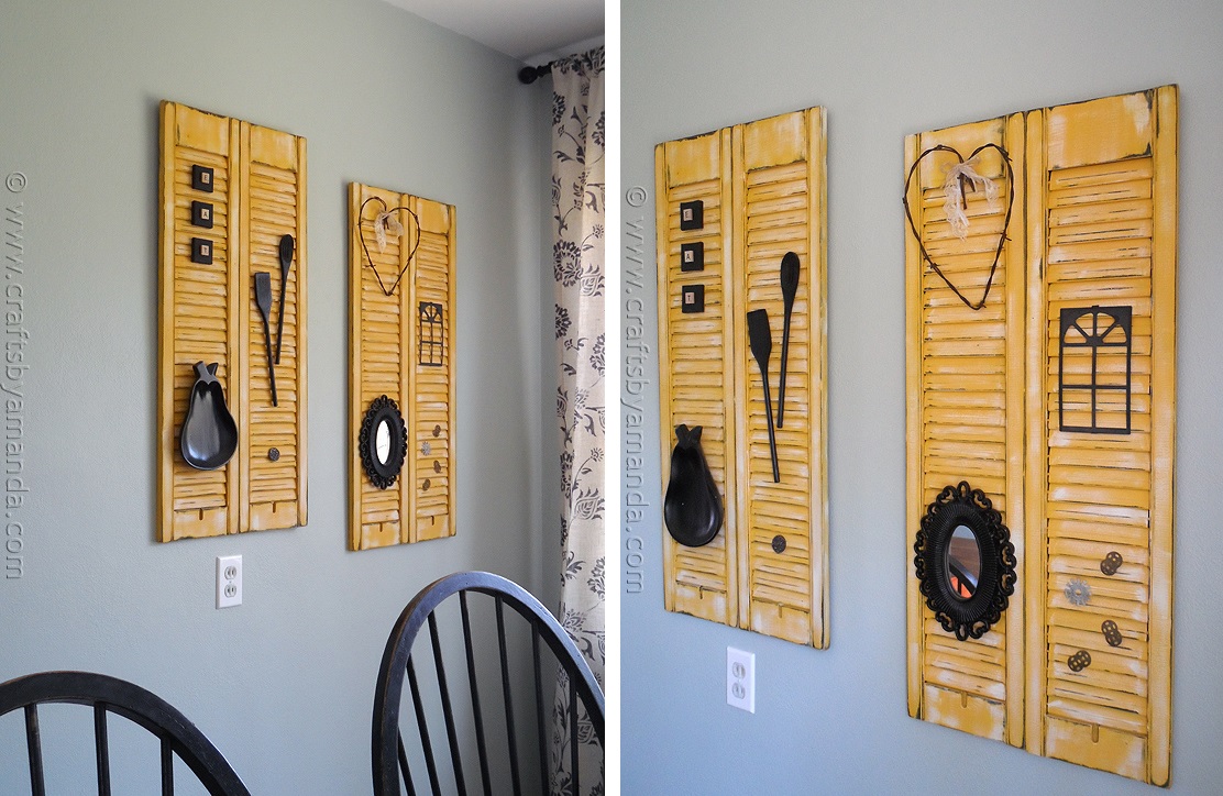 Yellow washed dining area wall art with wooden shutters